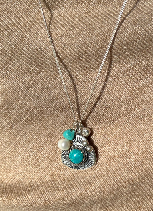 Navo Turquoise and silver pendant with silver and pearl drops